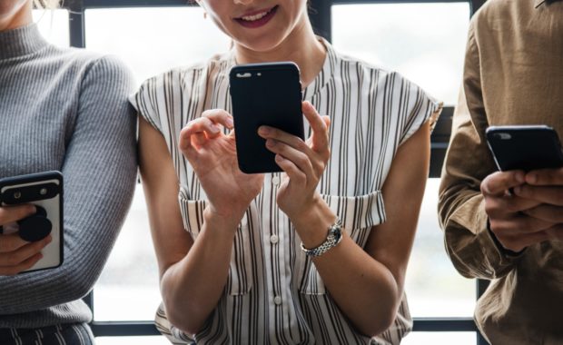 Adults busy on cellphones